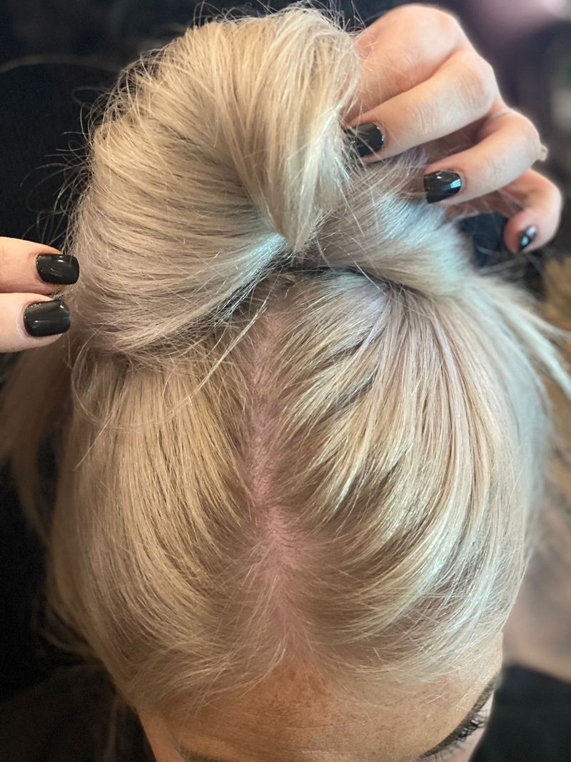 Arrange hair into a messy bun